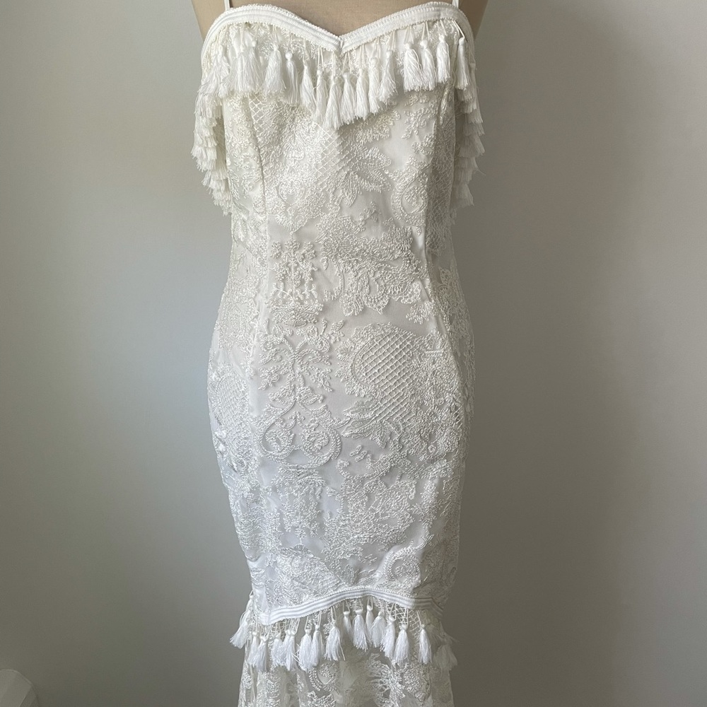 White lace body con mermaid midi dress with tassel detail
